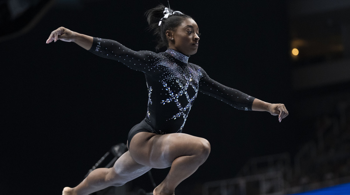Simone Biles performs on the balance beam during the 2023 U.S. Gymnastics Championships at SAP Center.